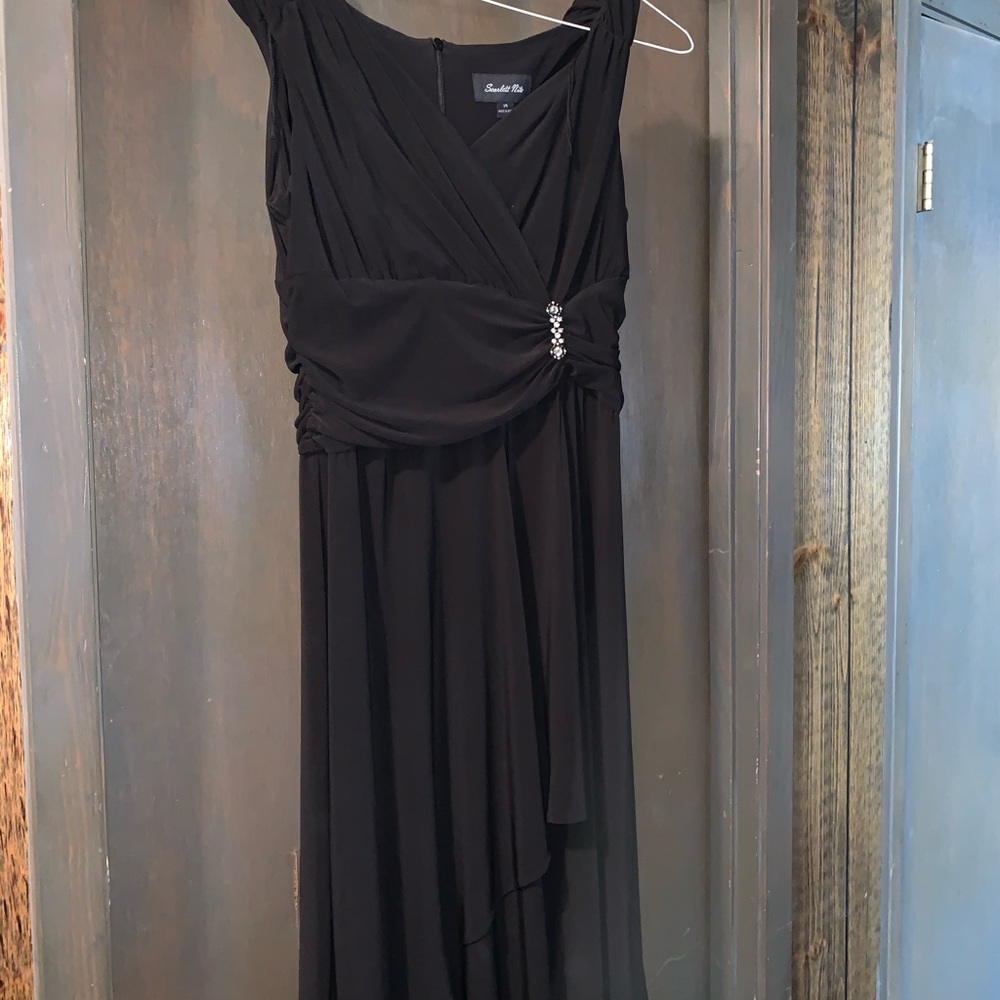 Evening gown. Black in color